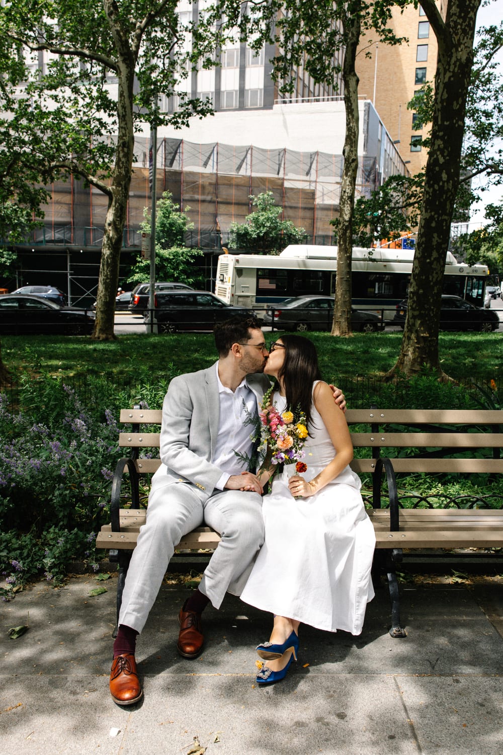 Katherine and Liam on a park bench in Brooklyn