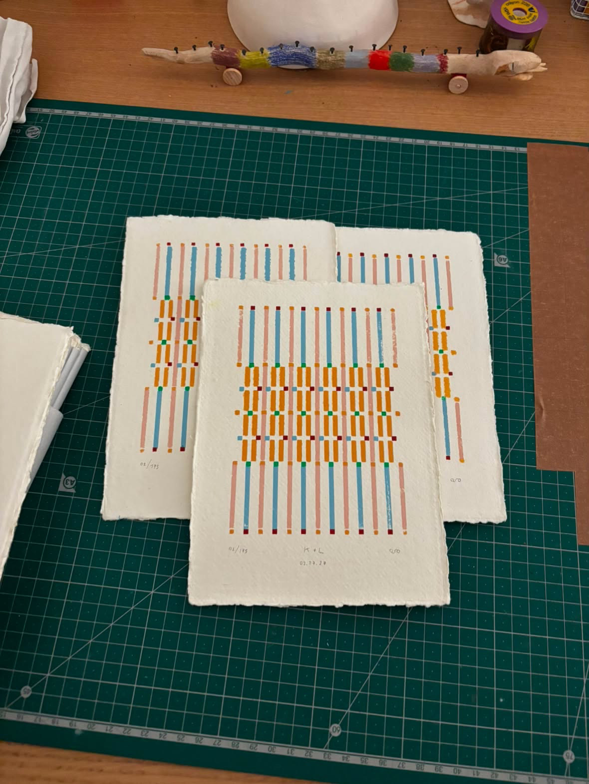 Finished invitation prints, numbered and signed by oso