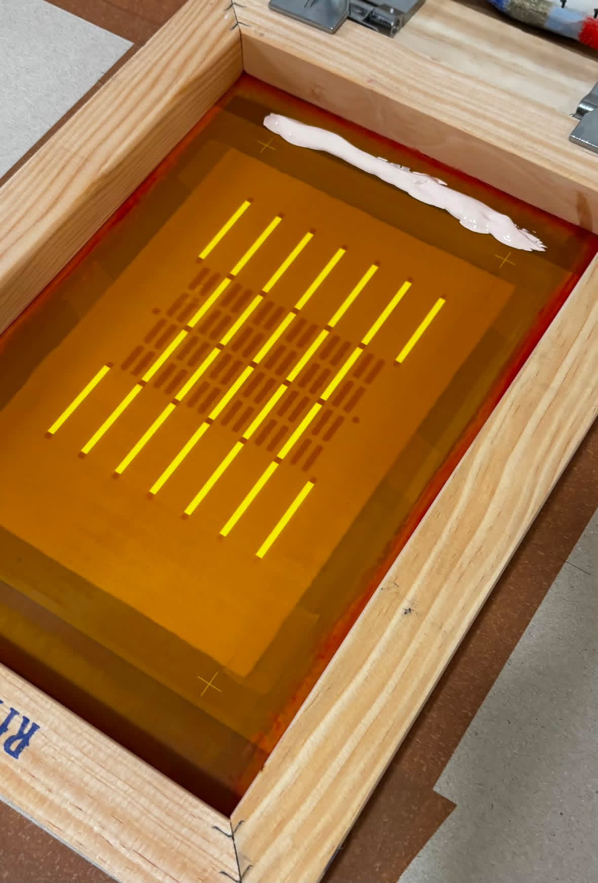 The silkscreen for the invitation design, ready for printing